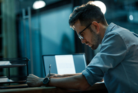 man working at laptop