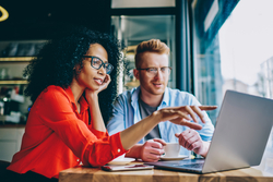 woman and man working at computer