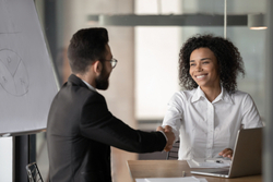 man and woman shaking hands