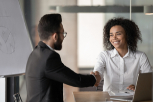 man greeting young woman