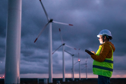 man working at wind farm