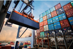 shipping containers being loaded