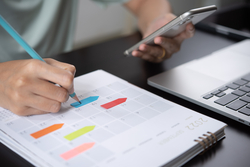 worker creating work timetable