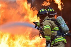 Image of firefighters fighting a fire