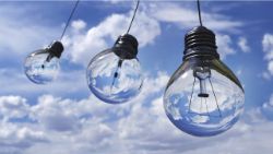 Three light bulbs against a sky background