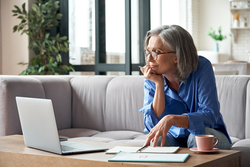 women working at laptop